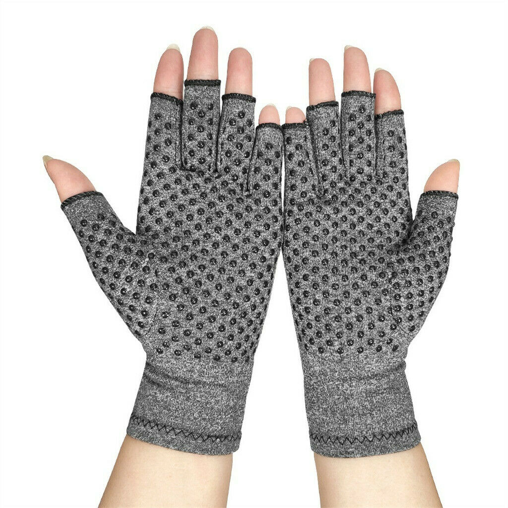 Therapeutic compression heat gloves in grey, front view, with open fingertips and textured grip to help support hand comfort.