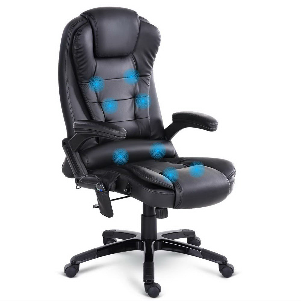Black heated massage office chair with 8 vibration zones, ergonomic high back and lumbar heat support, front view beside a work desk.