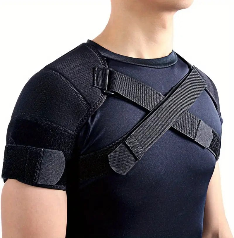 Dual shoulder compression support wrap in black, hero front view, showing crossover adjustable straps and low-profile panels that help stabilise both shoulders.