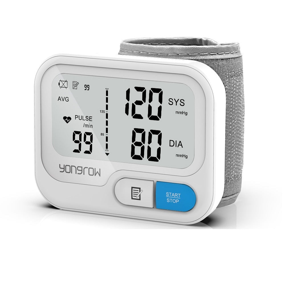 Digital wrist blood pressure monitor, front view, showing large LCD with systolic, diastolic, and pulse readouts plus compact wrist cuff and one-button control.