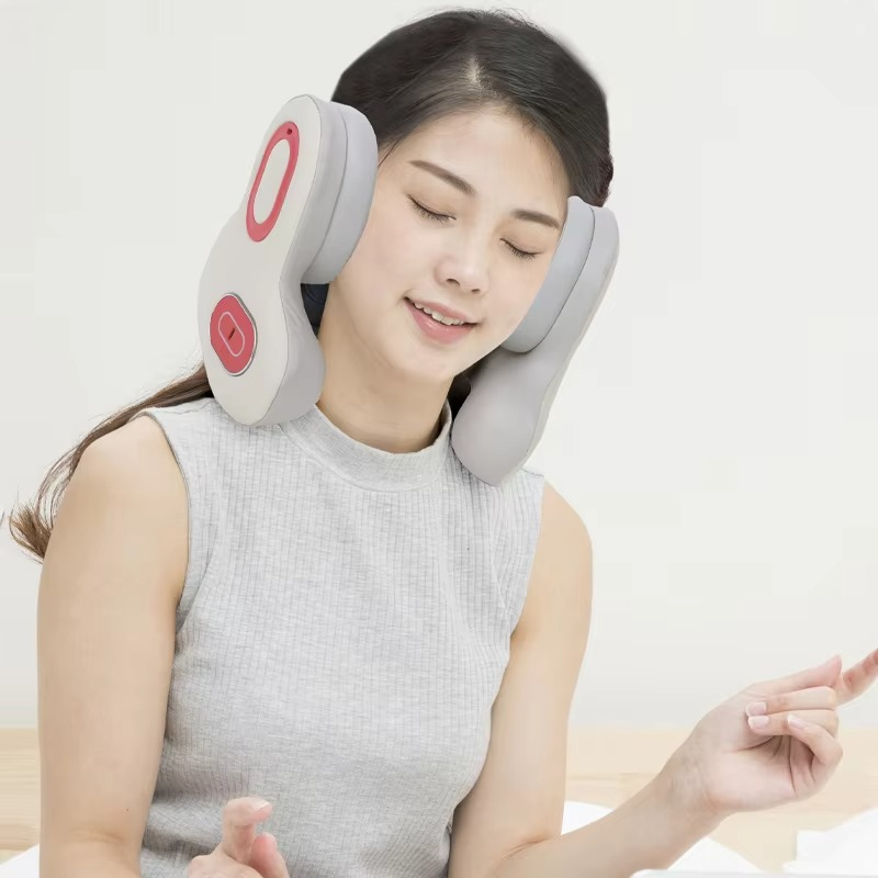 Electric neck traction cloud massager in front view with heat, vibration and Bluetooth music features, designed to support relaxed neck alignment.