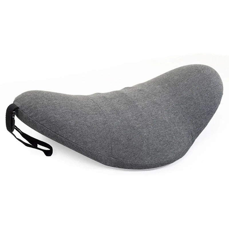 Memory foam lumbar pillow in dark grey, front view, with rollable design and ergonomic shape to help support the lower back.