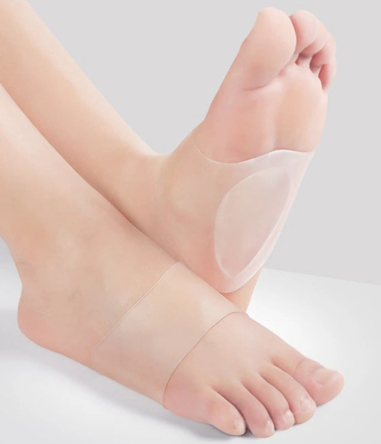 Silicone arch support insoles, hero angle, one-size pair in white and skin colour designed to add gentle arch lift inside everyday shoes.