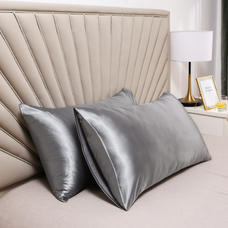 Satin pillowcase front view in solid colour, smooth polyester–cotton satin weave designed to support low-friction comfort for hair and skin.