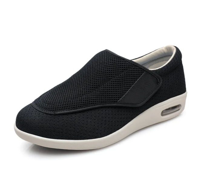 Orthopedic walking shoes in a front hero angle showing breathable fabric upper, cushioned insole, and roomy toe box for everyday comfort.