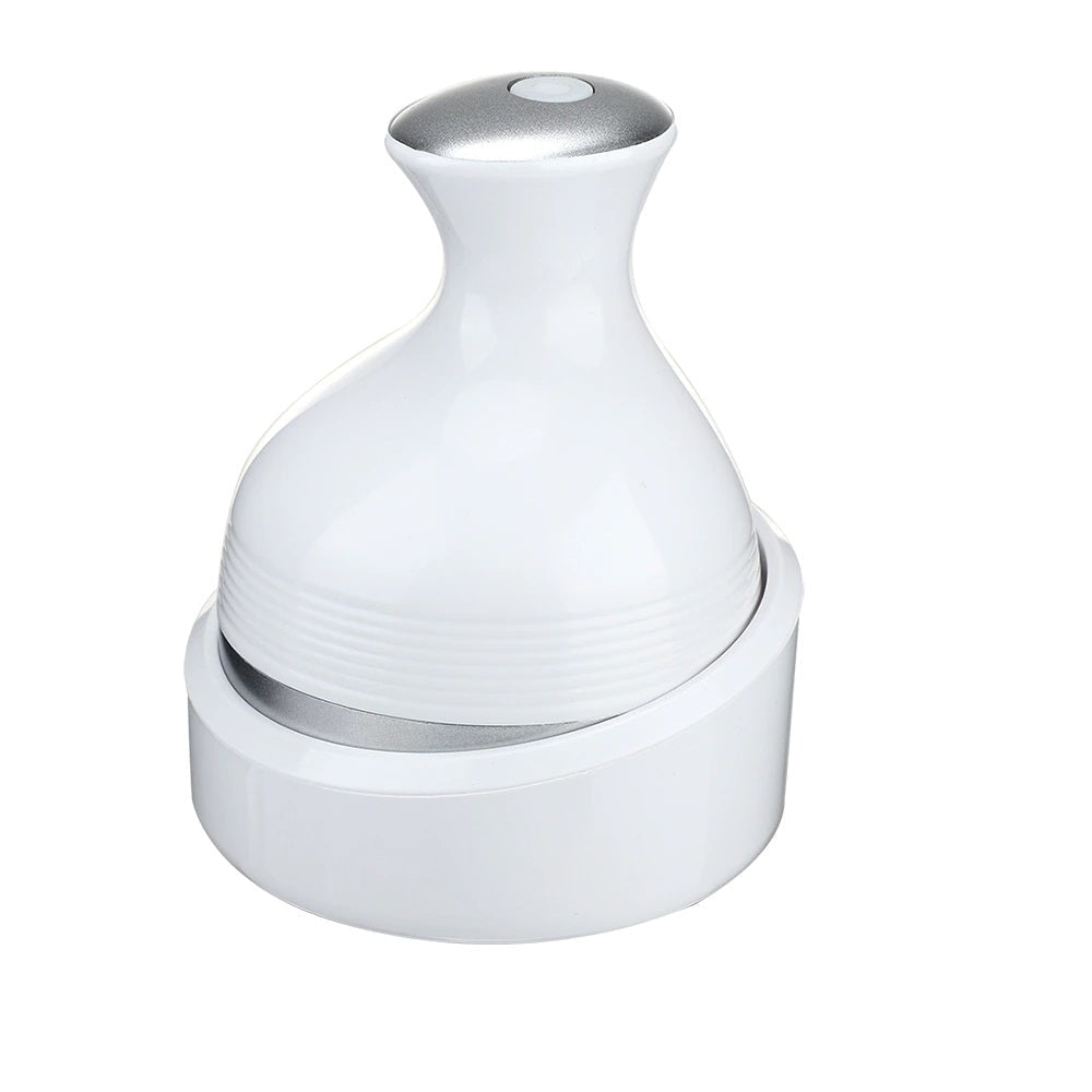 Waterproof wireless scalp massager in white, hero view showing four detachable rotating heads and compact charging dock for easy daily use.